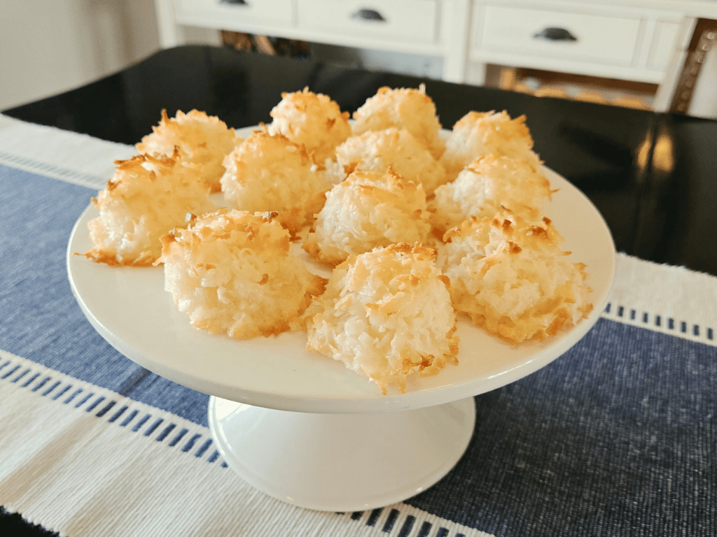 Classic Coconut Macaroons on a white pedestal