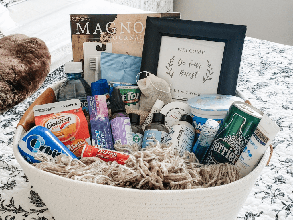 Gift basket with a magazine, WiFi password, asprins, drinks, gum, etc.